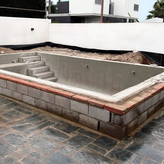 Construcción de Piscina gunitada o piscina de obra y Terraza en Playa Almarda, Sagunto, Valencia por Mediterranean Pool